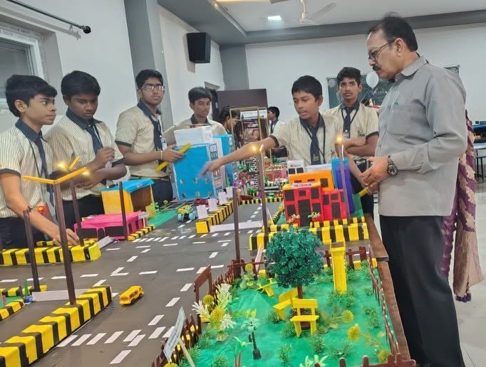 Saiteja Vidyaniketan students presenting a project model